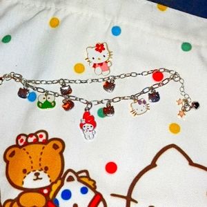 New Sanrio canvas Hello Kitty bag, double chain bracelet and brooch